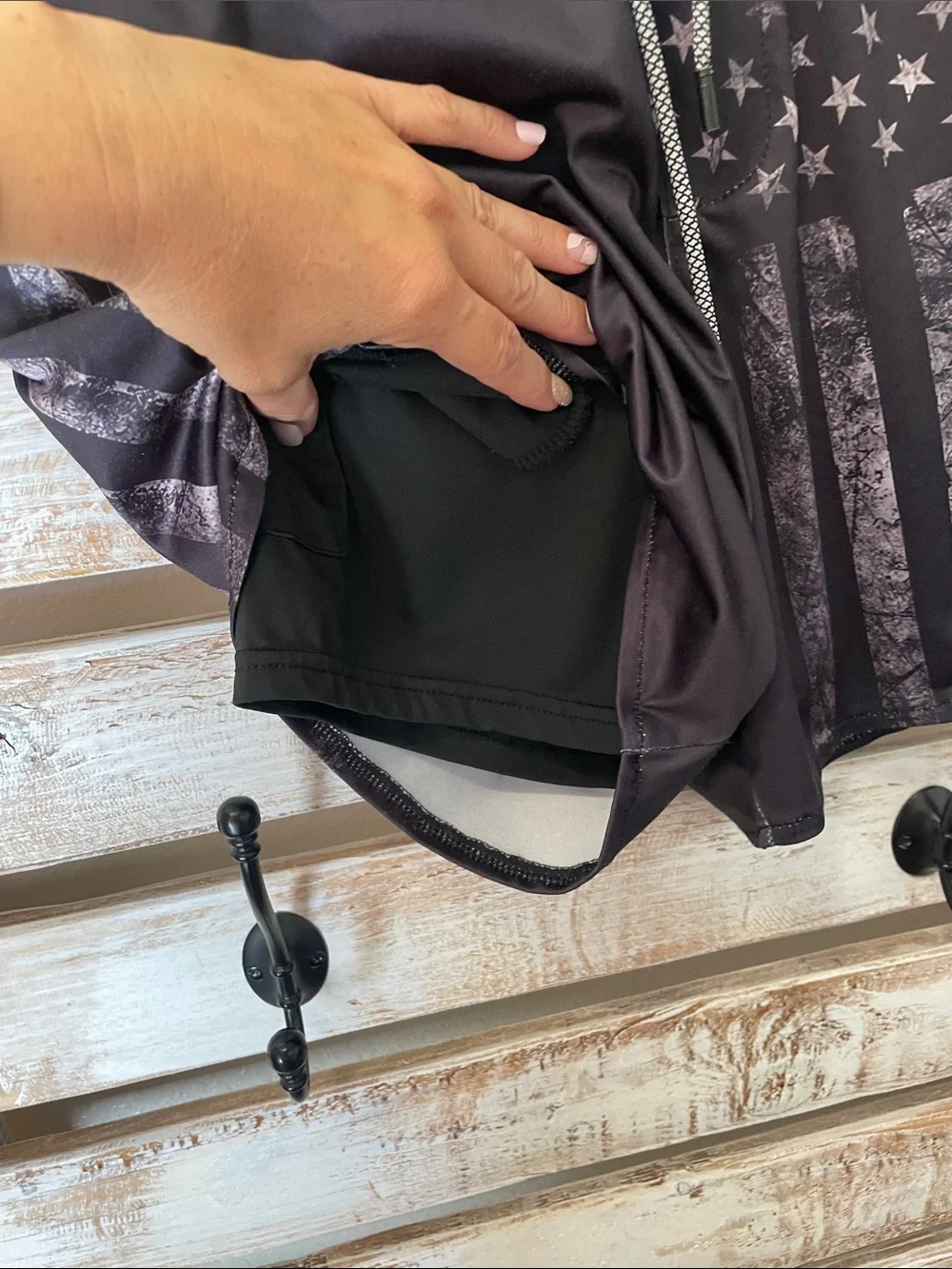 black tactical-style swim trunks by FT Fenteng | faded American flag has pockets